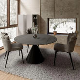 130 Cm Matt Grey Sintered Stone Ceramic Top 4 Seater Round Dining Table with Extension and Round Pedestal Base, Styled in a room with dining chairs