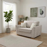 Andover Leo love chair with compact design and curved arms.