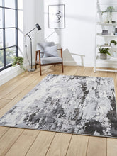 Apollo GR580 Modern Abstract Rug in Grey styled in a modern room