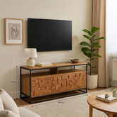 Atticus Acacia Media Unit – carved 3D wood front, black metal frame, open shelf and storage cupboards. Modern, compact TV stand with bold design styled in a room