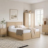 Ottoman bed with chevron design and oak or walnut effect wood finish.
