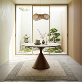 Shop the Ciro round dining table with walnut sculptural base and white or sunset cloud vein top. Stylish 119cm modern dining table.