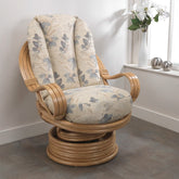 Madrid Light Oak Cane Swivel Rocker Chair with Oasis Floral Fabric Cushions