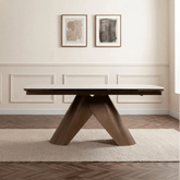 Shop the Varenna White Ceramic Extending Dining Table, 180-240cm. Featuring a marble-effect ceramic top, sculptural bronze base and seating for up to 10.