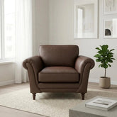 Modern accent chair with premium upholstery and wooden feet.