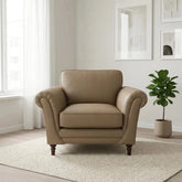 Harris Prestige leather love chair with soft cushioning and wooden feet.