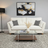 Joshua Matera 2 seater fabric sofa with soft upholstery and wooden legs.