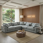 Spacious grey L-shaped corner sofa for contemporary living rooms.