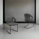 Styled in a room Phoenix Grey Leather Set of 4 Dining Chairs