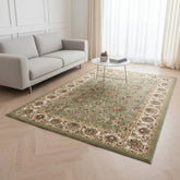 Keshan green rug with intricate traditional Persian pattern.