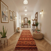 Tribal terracotta runner with bold geometric pattern.