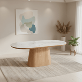 Modern dining table with marble top and wooden base in a stylish room.