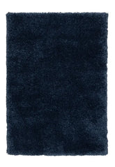 Blue shaggy rug with thick soft fibers and modern design.