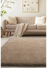 Luxury shaggy natural rug with deep pile and soft plush texture.