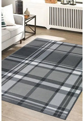 Grey rug with timeless design and subtle pattern.