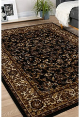 Decorative black rug with classic patterned design.