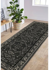 Dark grey runner with intricate traditional Beluchi pattern design.