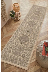 Natural runner rug with classic medallion pattern design.