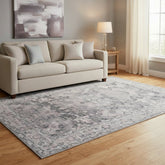 Grey rug with traditional inspired pattern.