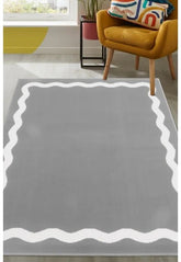 Grey rug with elegant scallop outline pattern design.