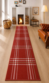 Red tartan runner rug with classic check pattern design.
