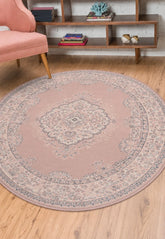 Round blush rug with soft elegant modern design.