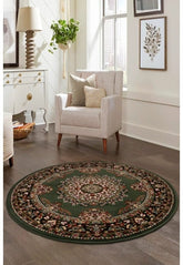 Round green rug with timeless traditional design.