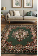 Green rug with timeless traditional design.