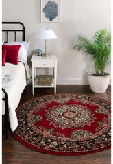Round red rug with timeless traditional design.