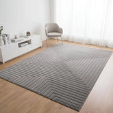 Grey rug with modern square pattern and geometric design.