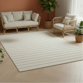 Ivory rug with modern striped pattern and subtle design.
