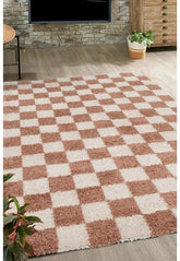 Terracotta check rug with soft shaggy high pile.