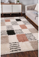 Shaggy rug with modern block pattern design.