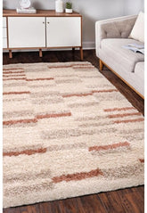 Nomadic shaggy linear rug with soft texture and modern style.