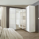 Rauch Lema 4 Door Sliding Corner Wardrobe - White High Gloss - Pendle Village Furniture
