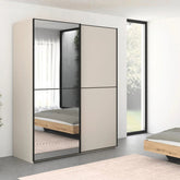 Rauch Black Supreme Duo Champagne 2 Door Sliding Wardrobe with Mirror with Black Trims and Door Handles Room Shot