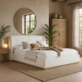 Elegant upholstered bed with curved headboard and plush boucle texture.