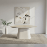 Modern dining table with a wooden top and concrete base on a white background