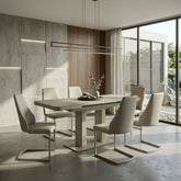 Susan extending dining table with Milan cantilever dining chairs. Stylish modern dining set with drop leaf extension.