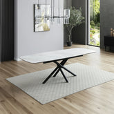 Modern matte white ceramic extending table with natural veining, extending from 1.6M to 2.4M.