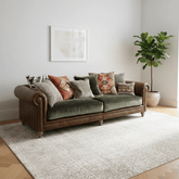 Luxury Tetrad Constable Grand Sofa with leather frame and Coco Velvet cushions. Handcrafted British Chesterfield-inspired design.