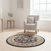 Circular navy rug with intricate classic design.
