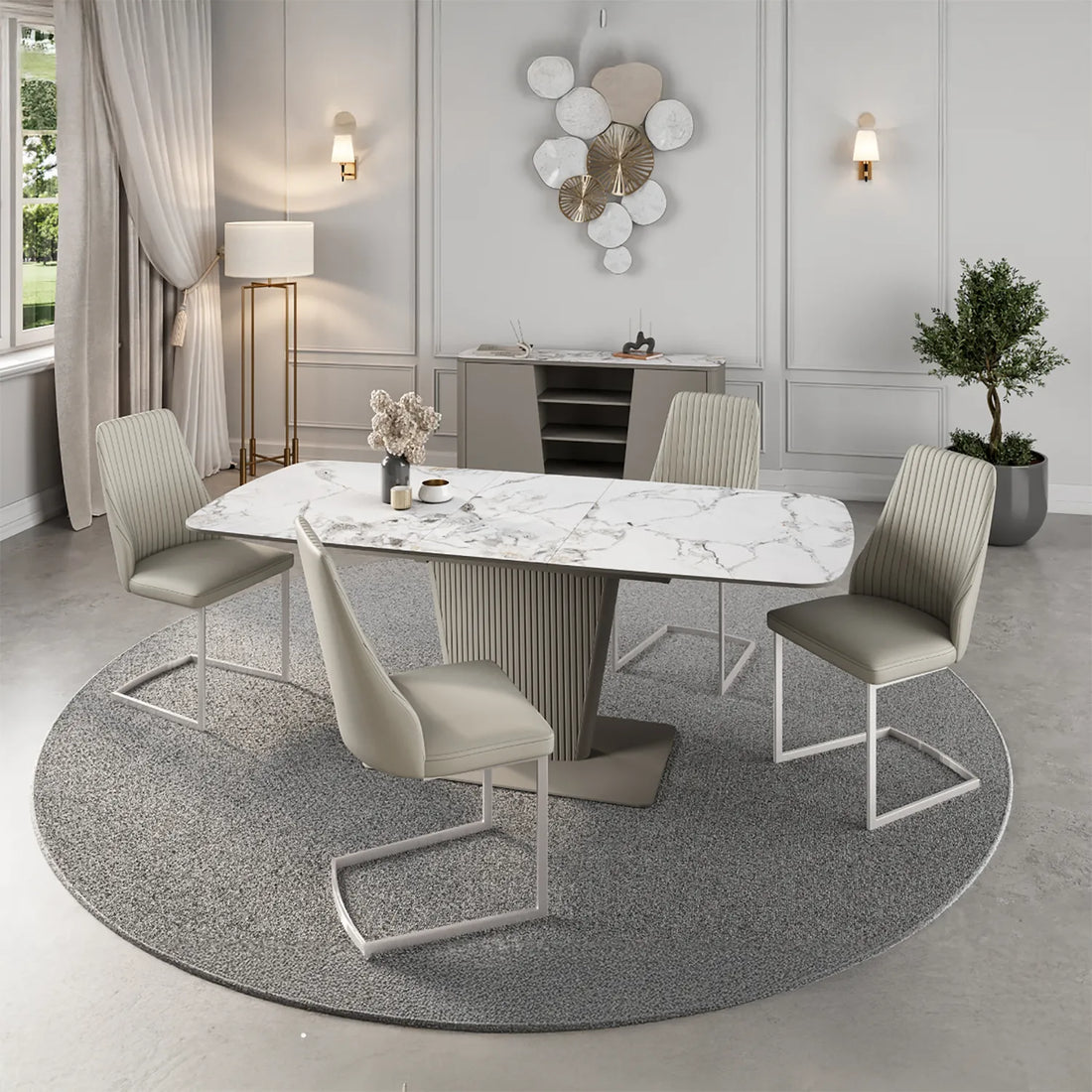 Ceramic Dining Table with Light Grey Metal Base and White Marble Effect Ceramic Top Styled in a living room with matching dining chairs