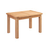 A light natural wood rectangular table with four legs, shown from a three-quarter angle on a plain white background.