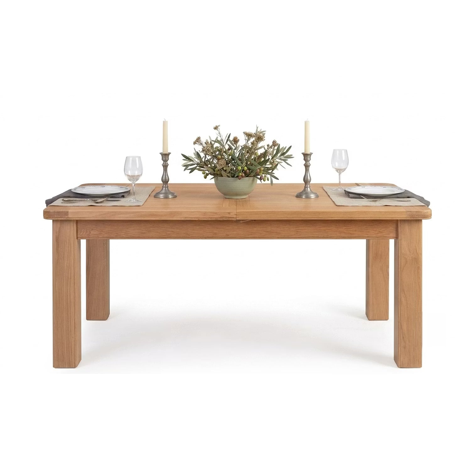 Shop the Chatsworth oak extending dining table. Extends from 120cm to 153cm with a butterfly extension, solid oak construction and classic four-leg design.