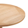 Close-up of a Chatsworth Oak Round Dining Table 120cm showing the tabletop grain and beveled edge against a white background.