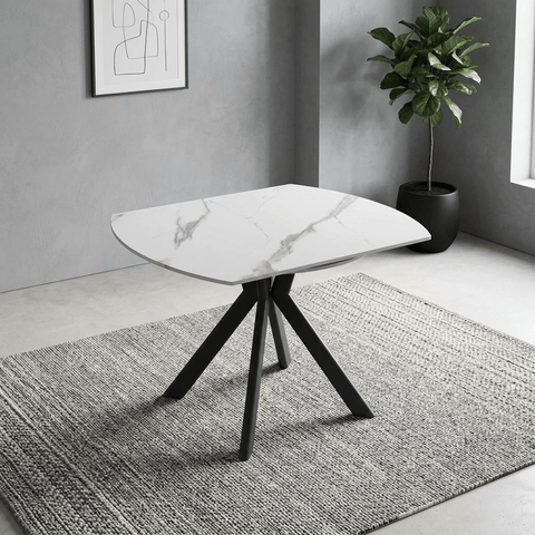 Shop the Cuneo White Gloss Ceramic Swivel Extending Dining Table. Featuring a 135cm ceramic top, practical swivel extension and dark grey metal legs.