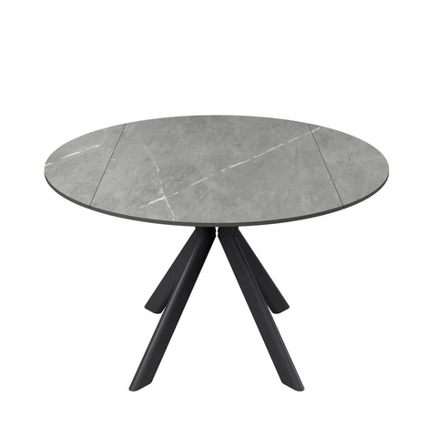 Round dining table with gray Matt Sintered Stone Ceramic top and black metal legs on a white background
