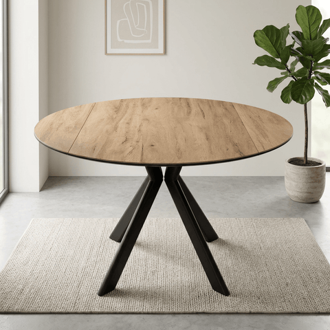 Shop the Cuneo Wood Look Ceramic Swivel Extending Dining Table. Featuring a 135cm wood-effect ceramic top, swivel extension and dark grey metal legs.