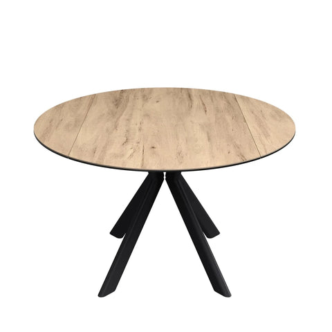 A round dining table with a wood-grain effect ceramic tabletop and a black three-legged metal base, shown against a plain white background.